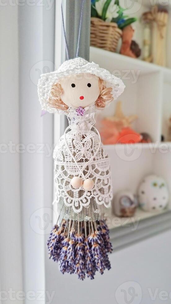 Charming decorative figure embraces calming lavandula essence photo