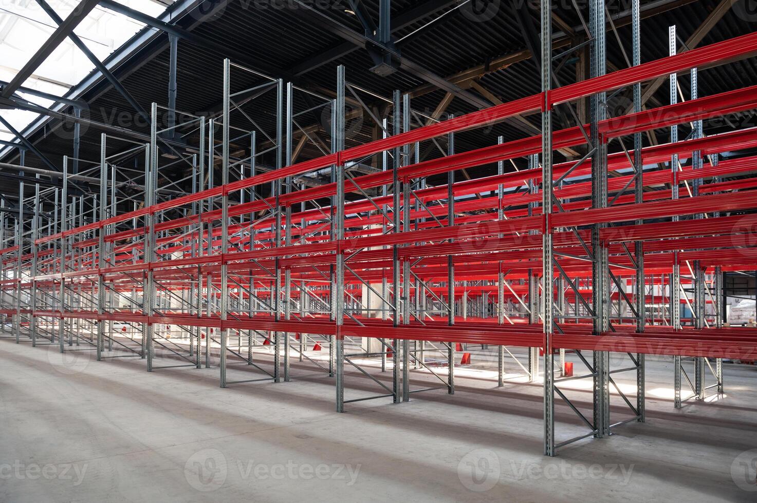 Logistics warehouse concept with empty high pallet racks, shelving system photo