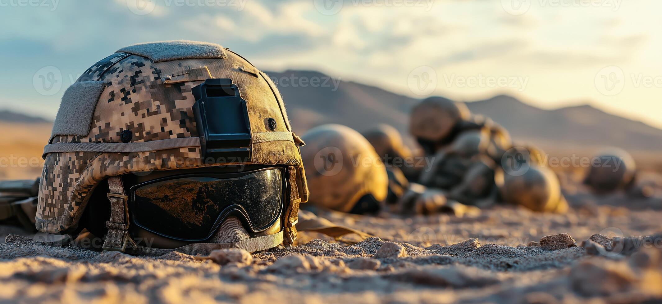 Military Helmet on Ground in Desert, Tactical Gear, War Zone, Ready for Combat photo