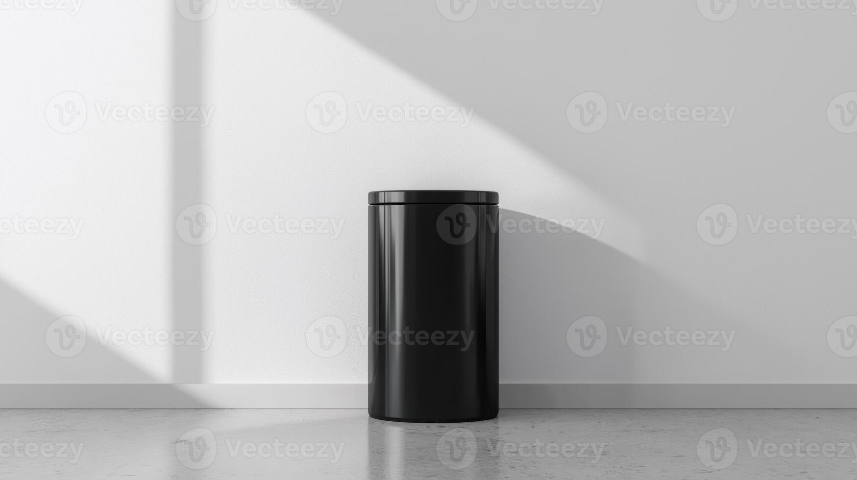 Modern Black Trash Can in Minimalist Interior Design Setting With Clean Lines and Natural Light in a Simple White Room photo