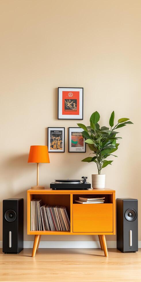 A room with a record player, speakers and a plant photo