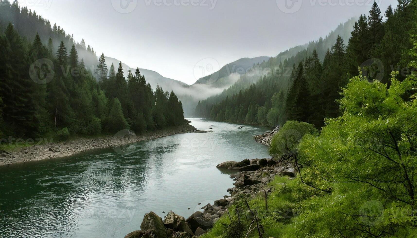 A river surrounded by trees and mountains photo