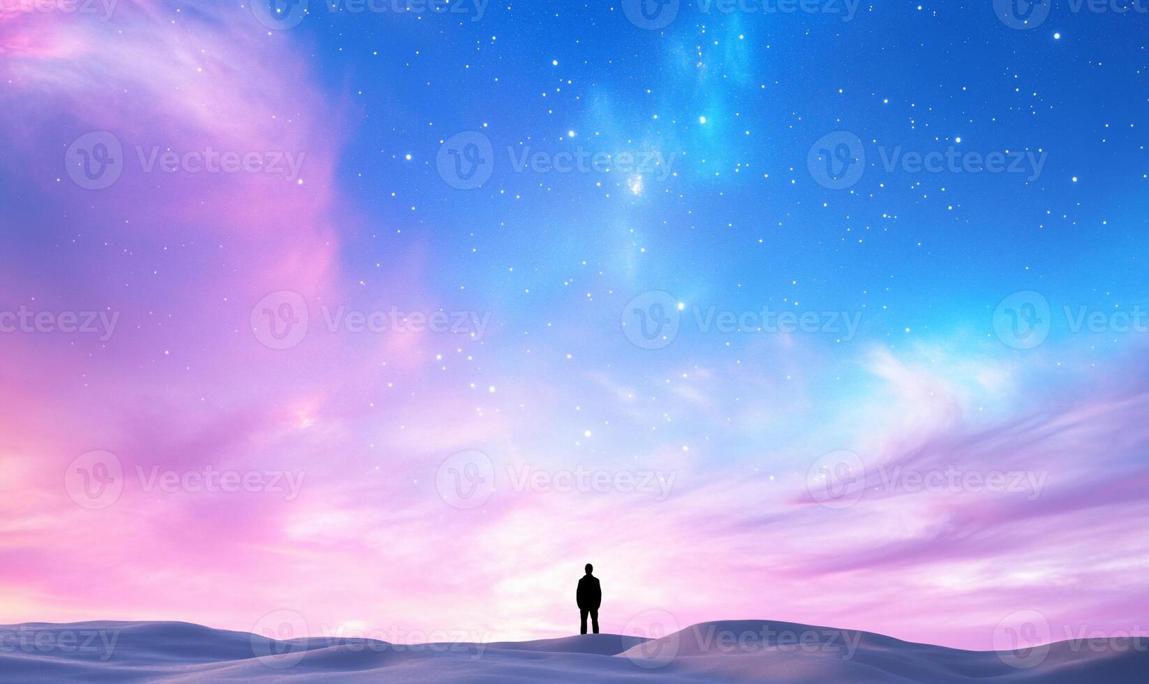 A silhouette against a vibrant, starry sky and colorful clouds. photo
