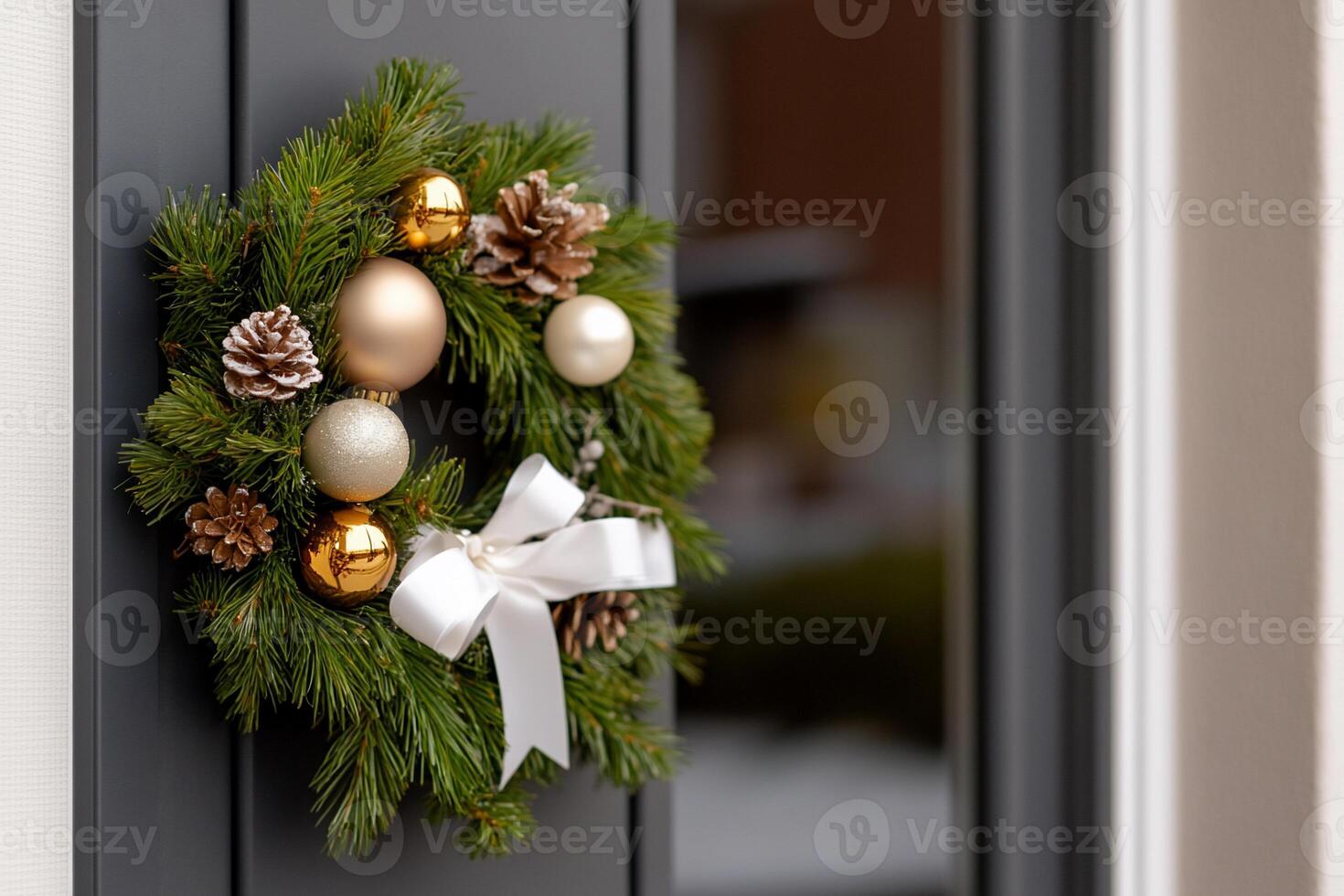 A festive wreath adorned with ornaments and pinecones on a door. photo