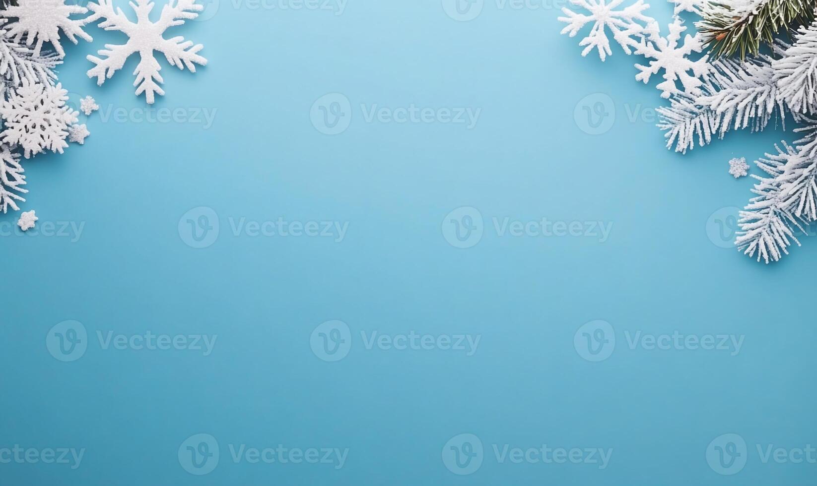 A winter-themed background featuring snowflakes and pine branches. photo