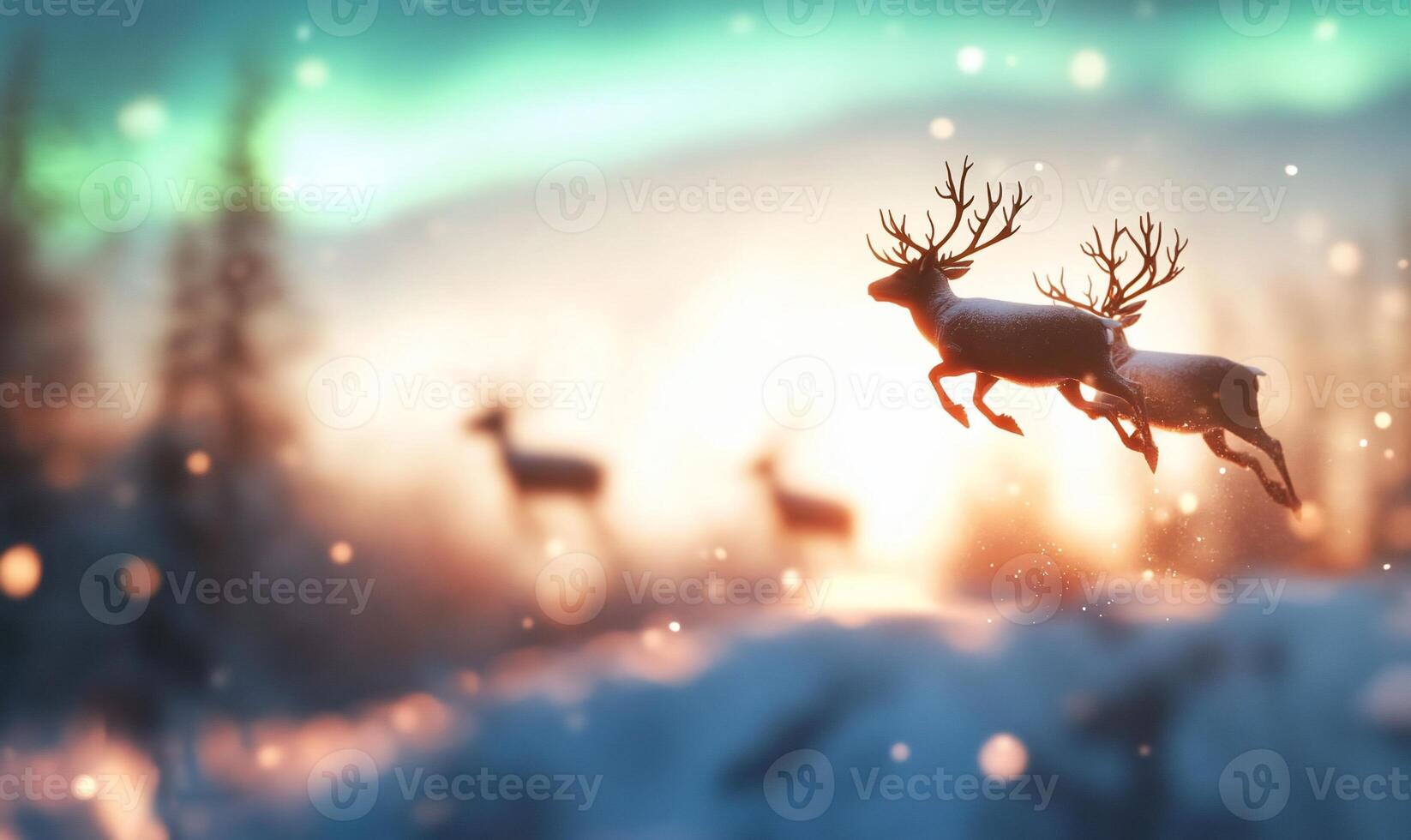 Two reindeer leap through a snowy landscape with a colorful backdrop. photo