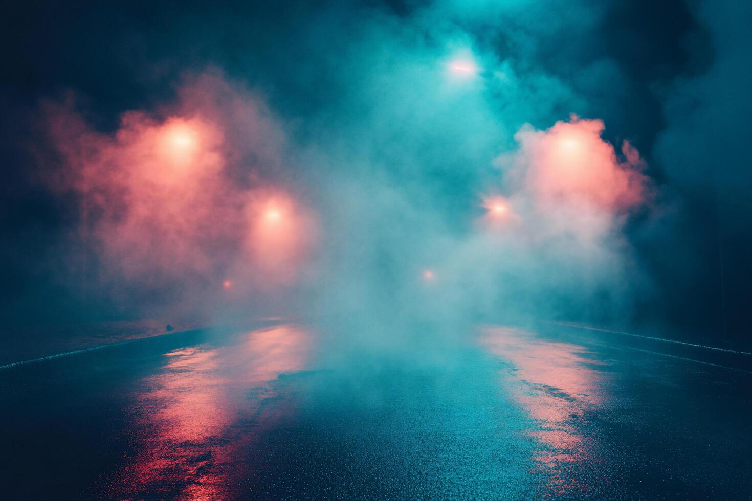 A foggy street illuminated by colorful streetlights at night. photo