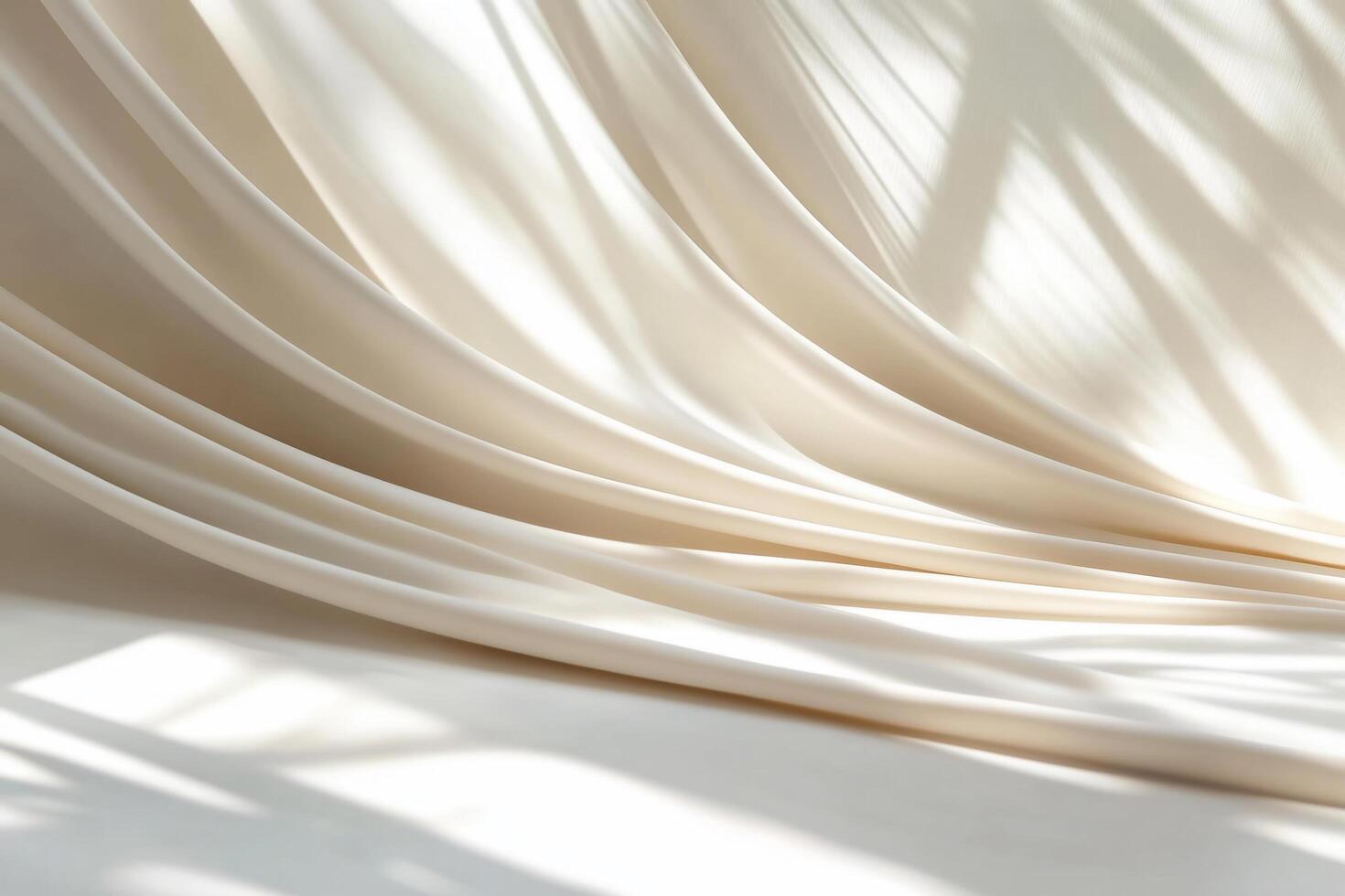 Soft, flowing fabric with gentle shadows creating a serene atmosphere. photo