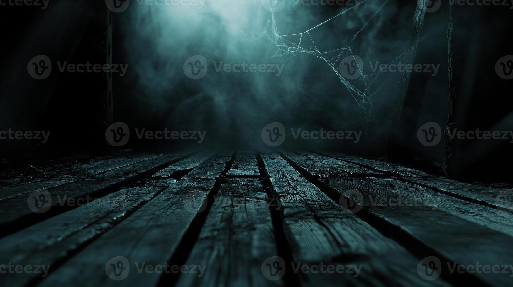 A dark, eerie space with wooden floorboards and foggy atmosphere. photo
