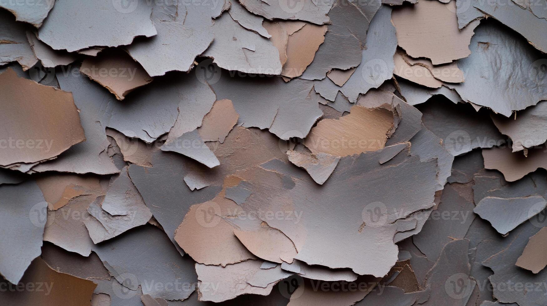 Close-up of textured paint layers in muted colors. photo