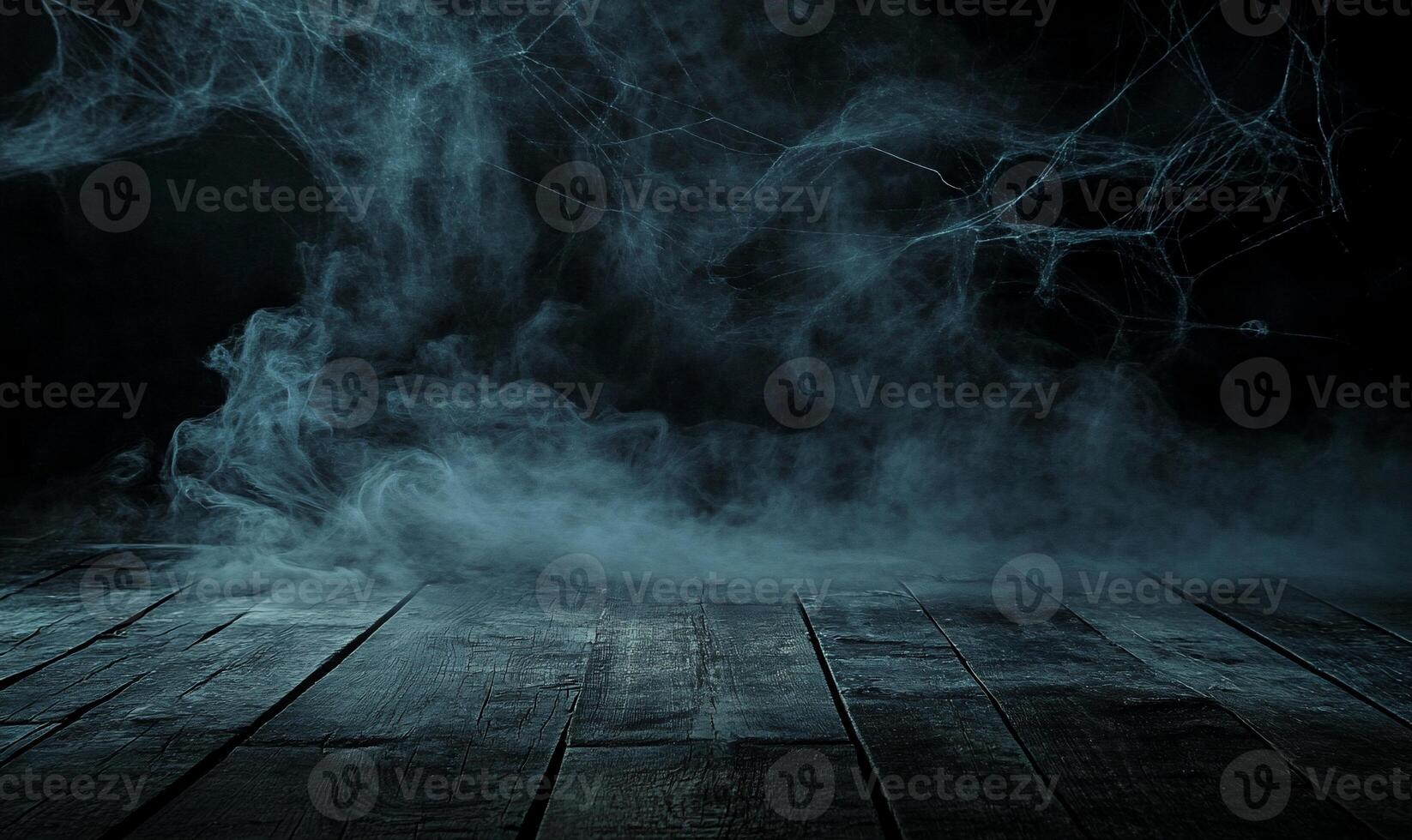 A dark, foggy scene with spider webs, evoking a spooky atmosphere. photo