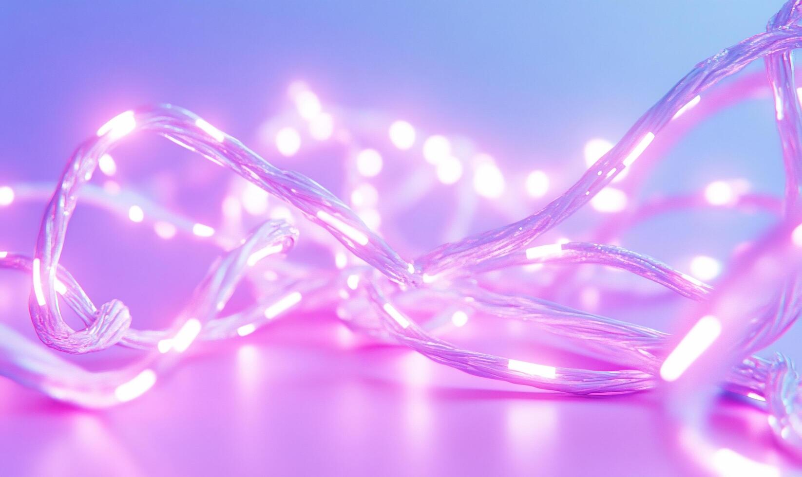 A close-up of glowing pink and white decorative LED lights. photo