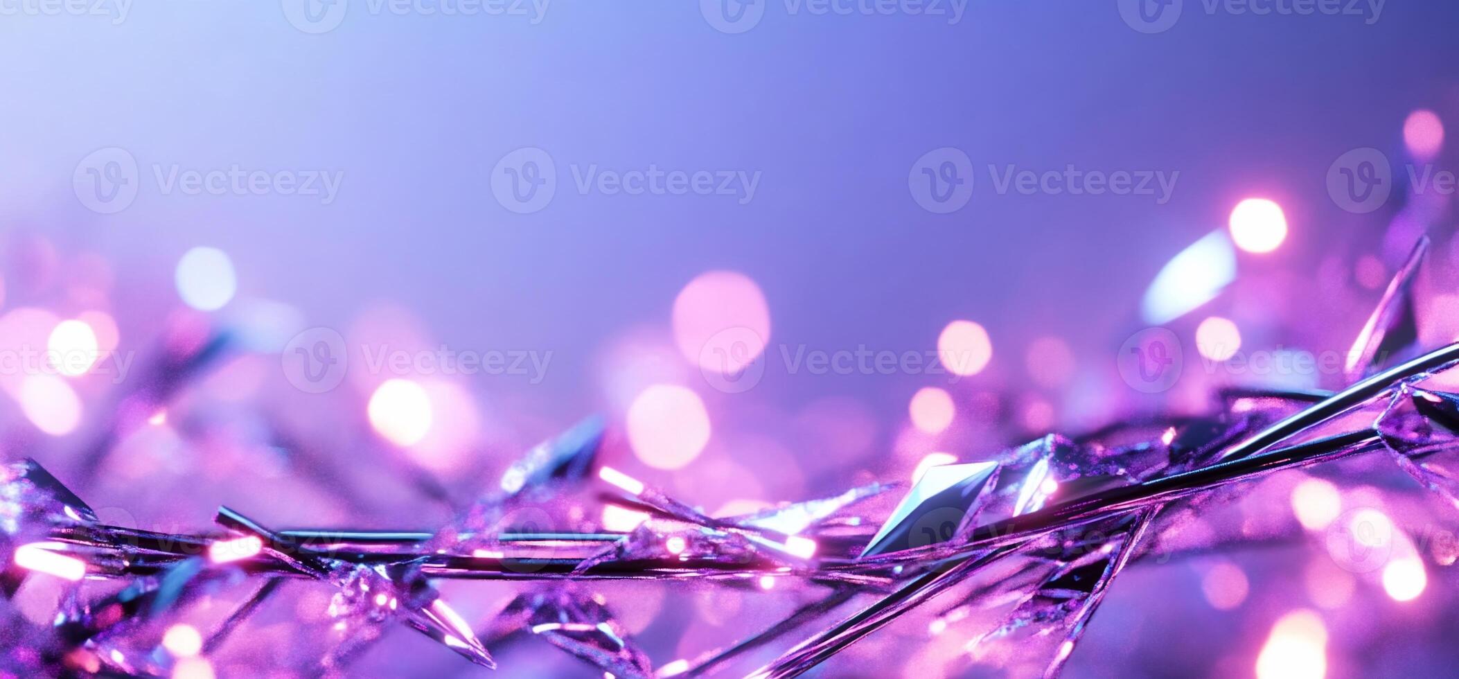 Purple christmas lights on a blue background photo