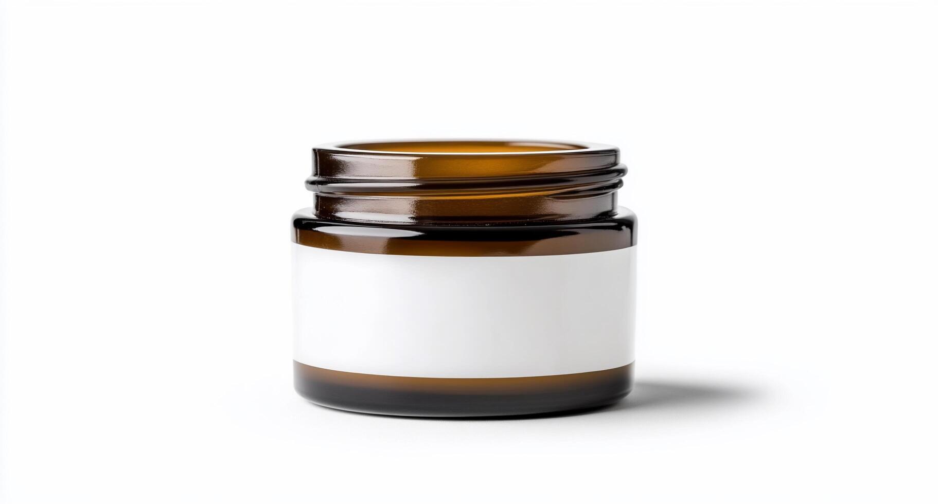A brown glass jar with a blank label for various products. photo