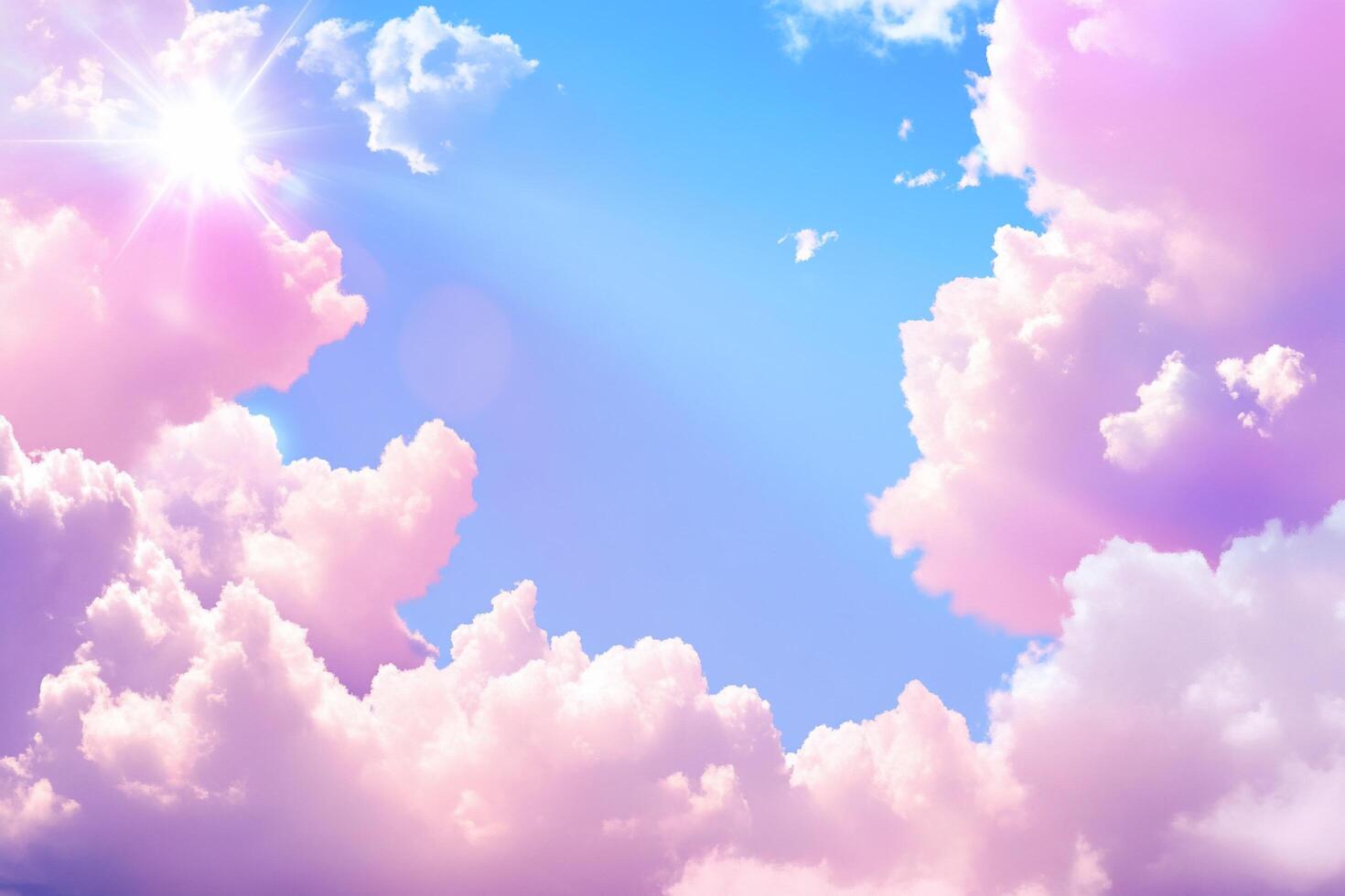A serene sky filled with soft pink and white clouds under bright sunlight. photo