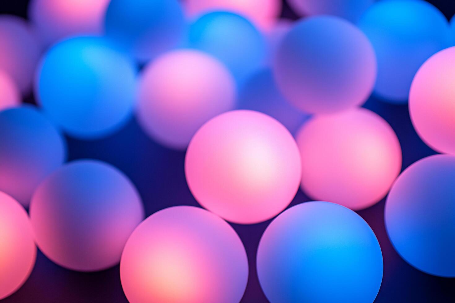 Colorful glowing spheres in shades of blue and pink, creating a vibrant scene. photo