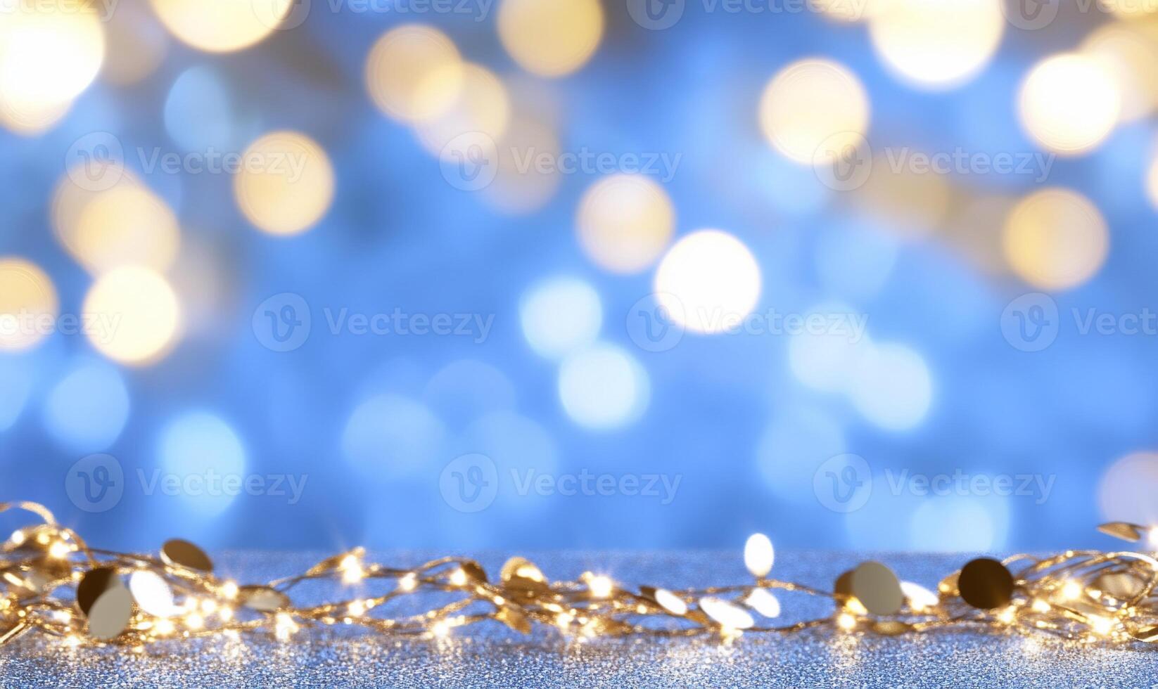 A blurred background with sparkling lights and decorative garland. photo