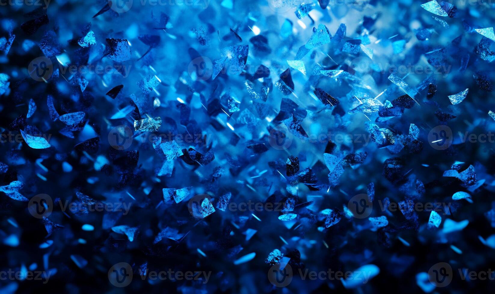 A close-up of shimmering blue crystals reflecting light. photo