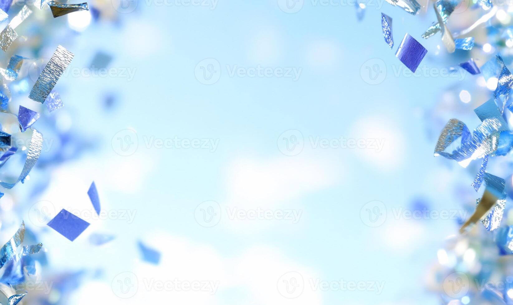 Colorful confetti against a soft blue sky background. photo