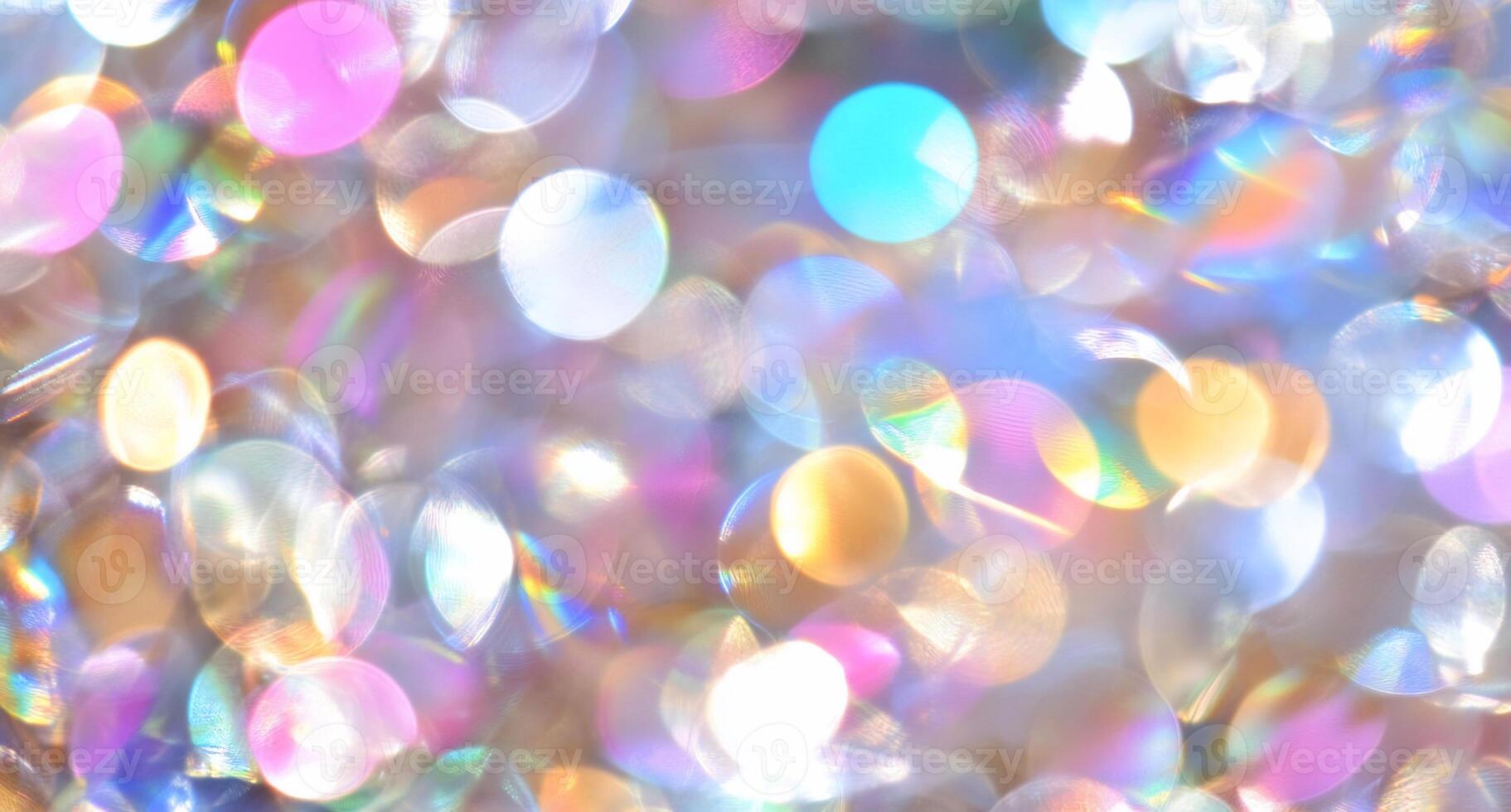 A vibrant, shimmering background of colorful bokeh lights. photo