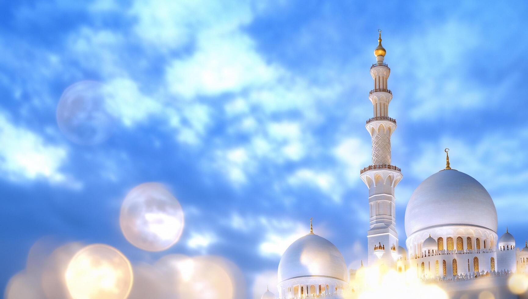 A majestic mosque against a blue sky with soft glowing lights. photo