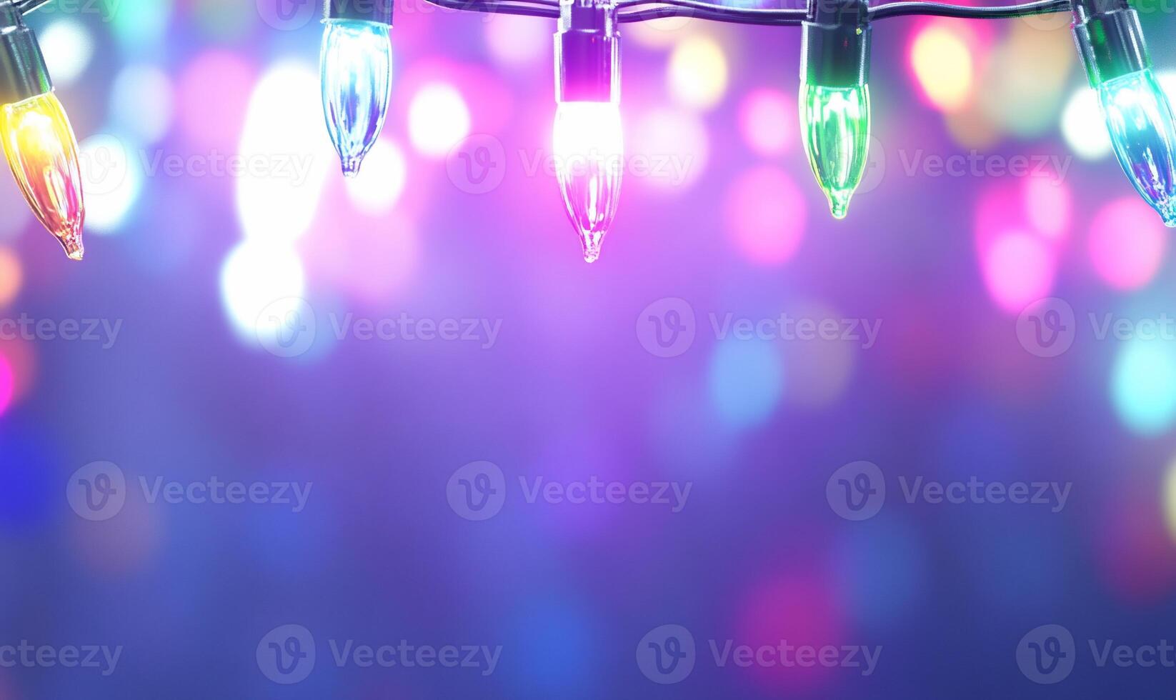 Colorful festive lights against a blurred background. photo