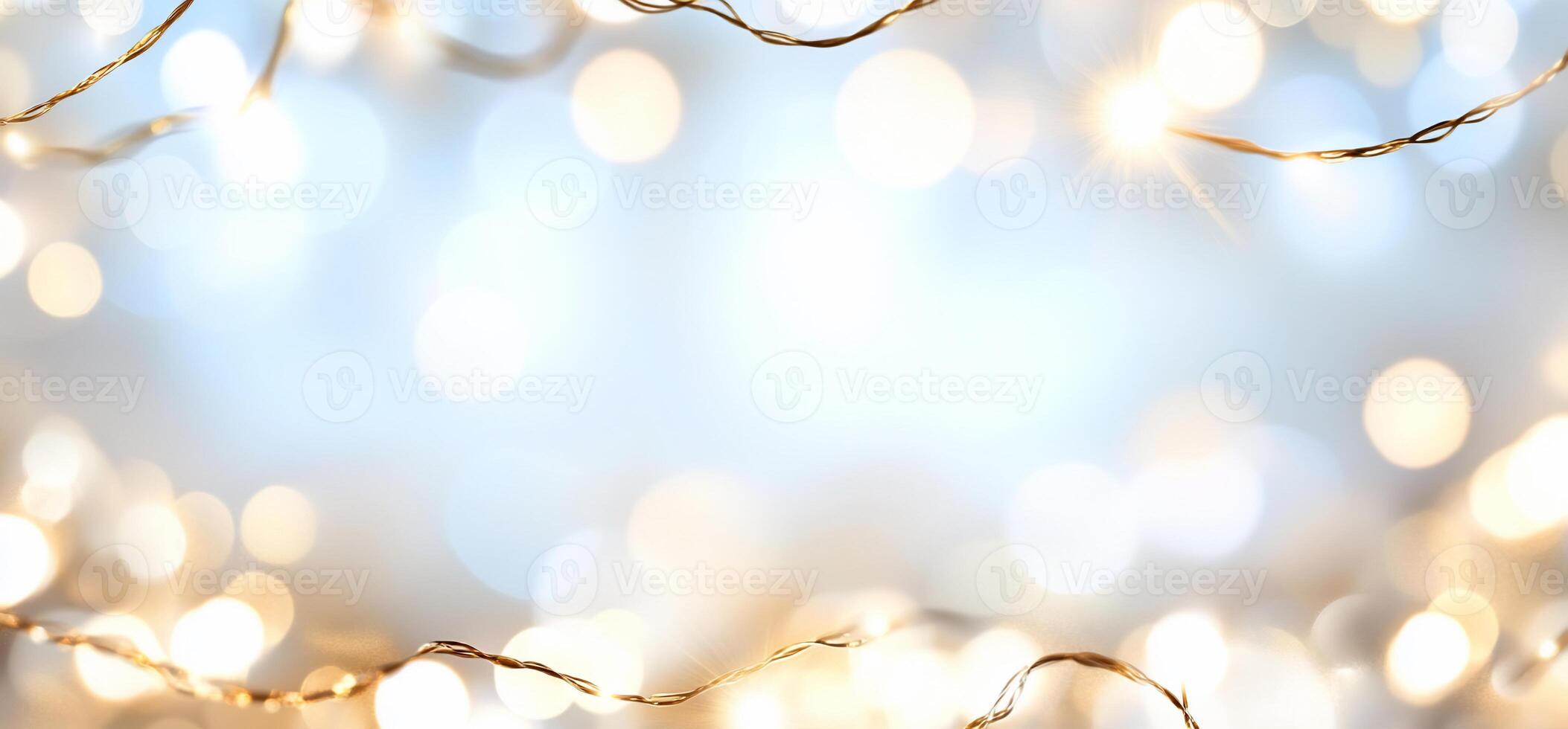 Soft bokeh lights with a golden twinkle effect for festive ambiance. photo