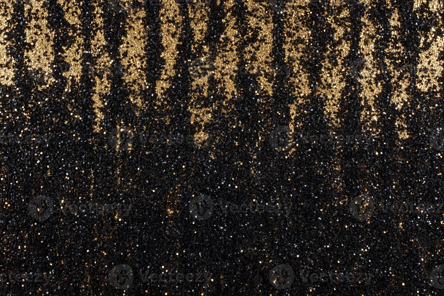 A shimmering pattern of black and gold glitter, creating a striking visual. photo