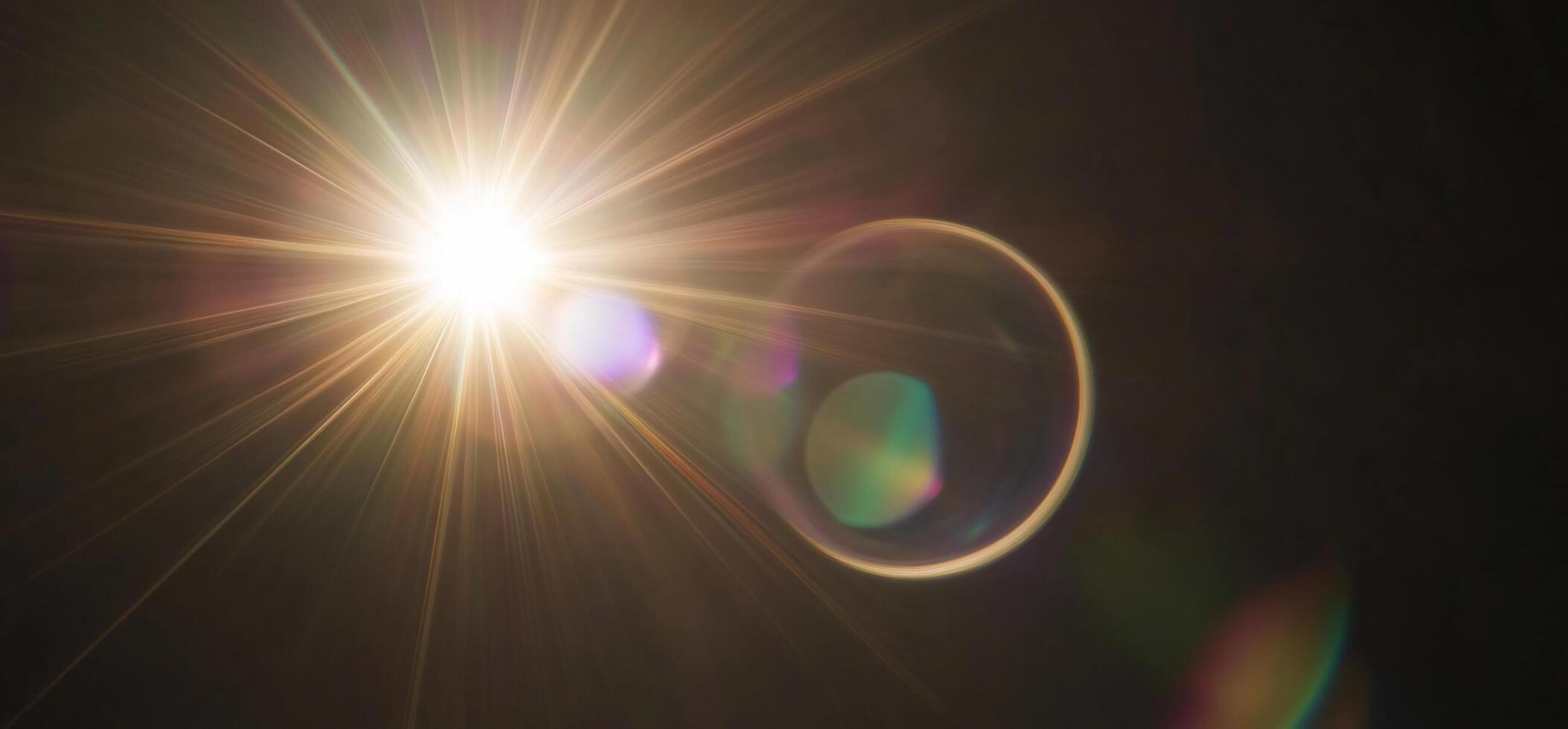 Bright light source with lens flare and colorful reflections. photo