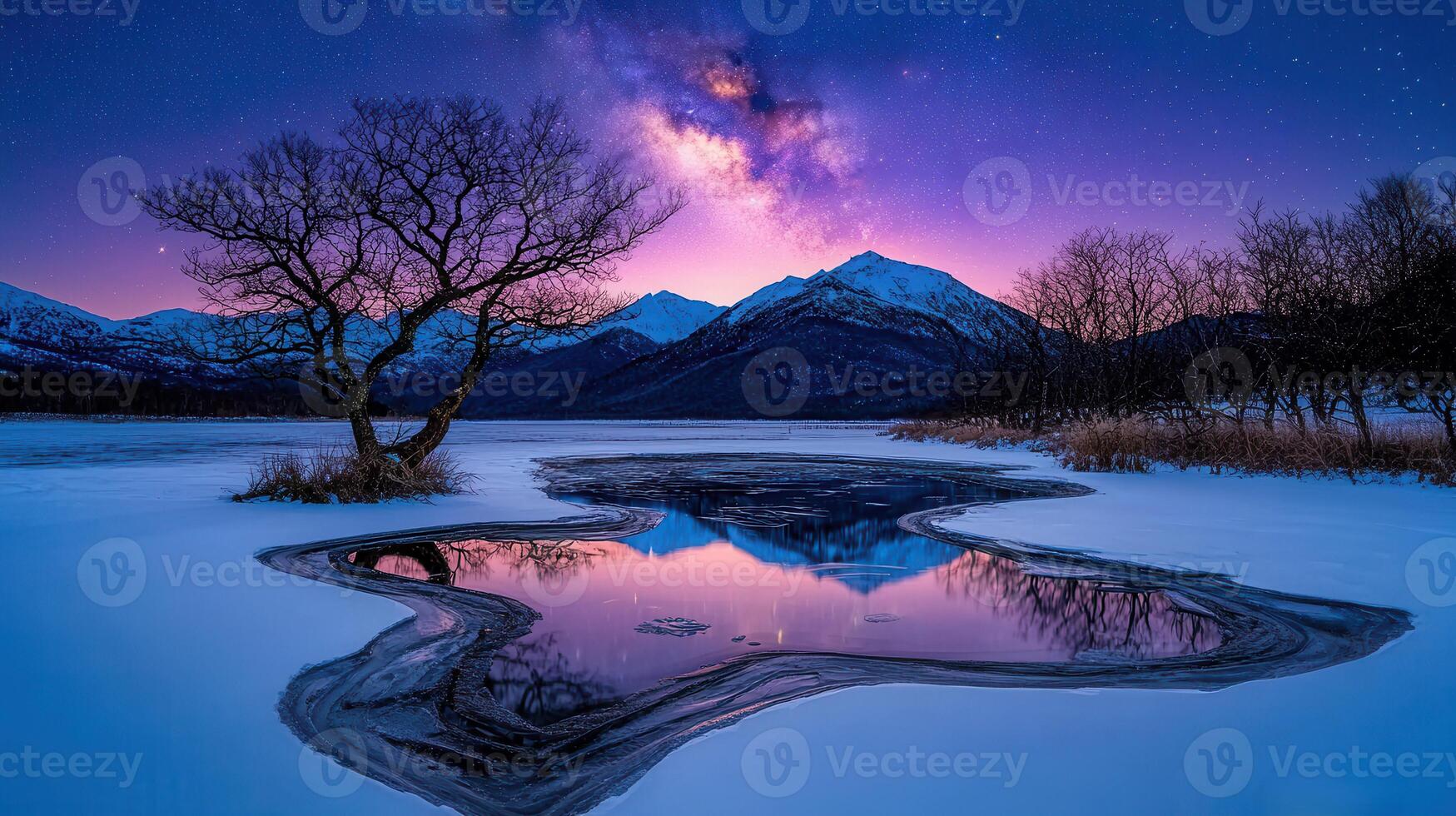 Serene Winter Landscape Milky Way over Frozen Lake Mountains and Lone Tree photo