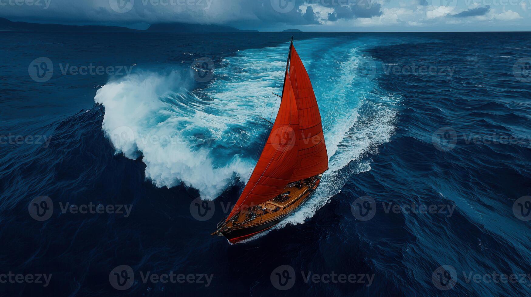 Dramatic Aerial View of Red Sailboat Navigating Ocean Waves photo