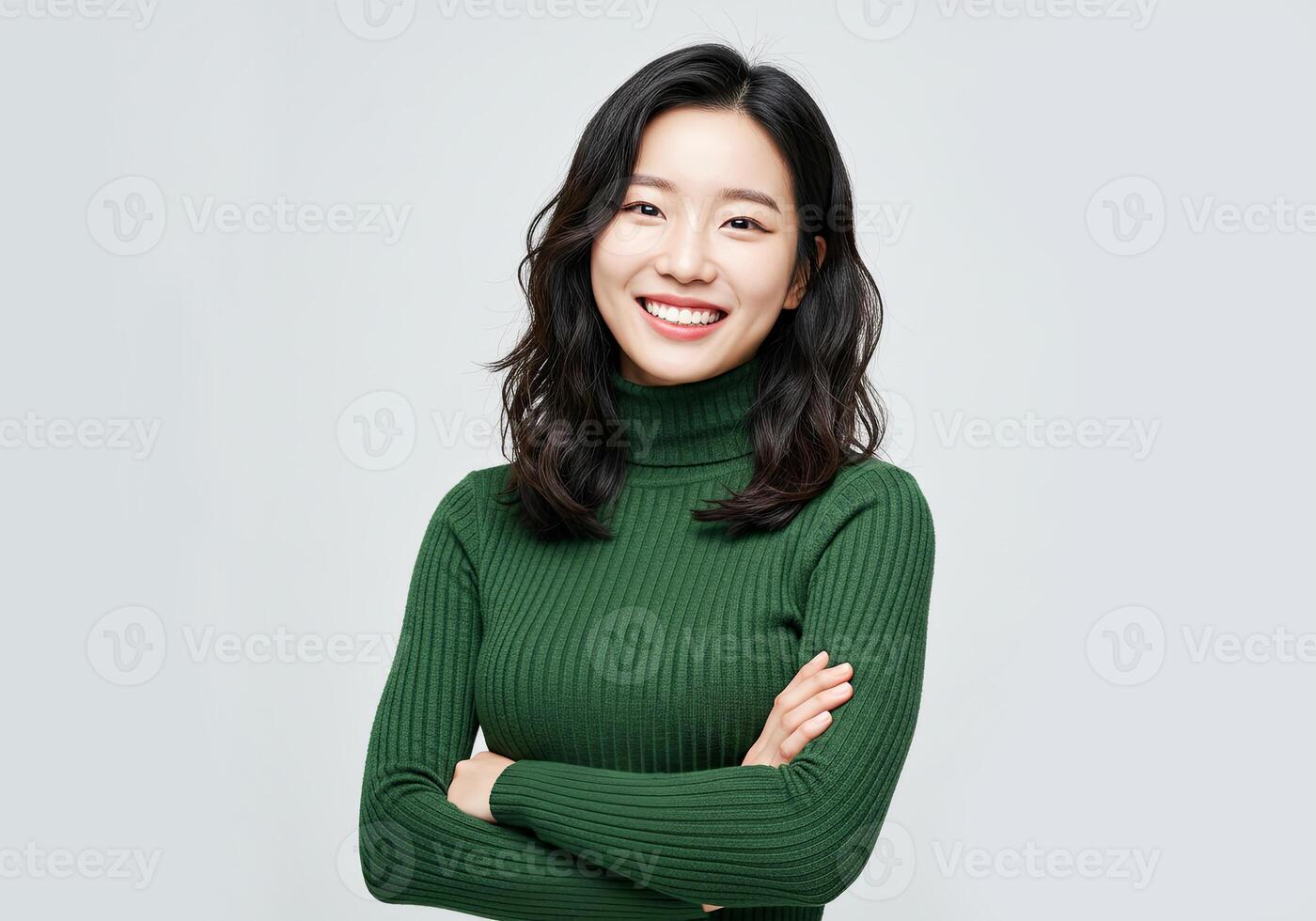 Asian woman in green sweater smiling photo