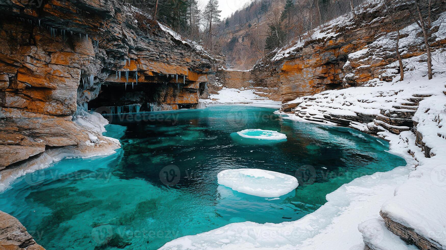 Stunning Teal Winter Lagoon in Rocky Canyon Ice Floes Snow Covered Cliffs photo