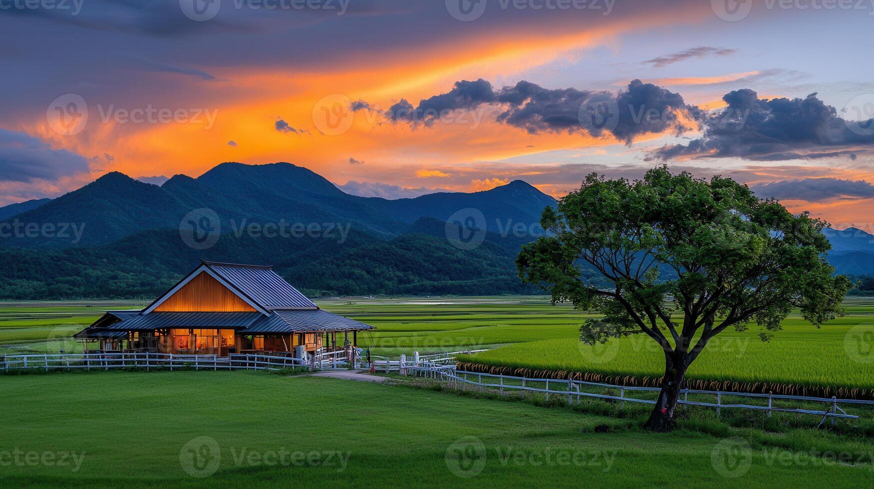 Serene Sunset Landscape House Rice Paddies and Majestic Mountains photo