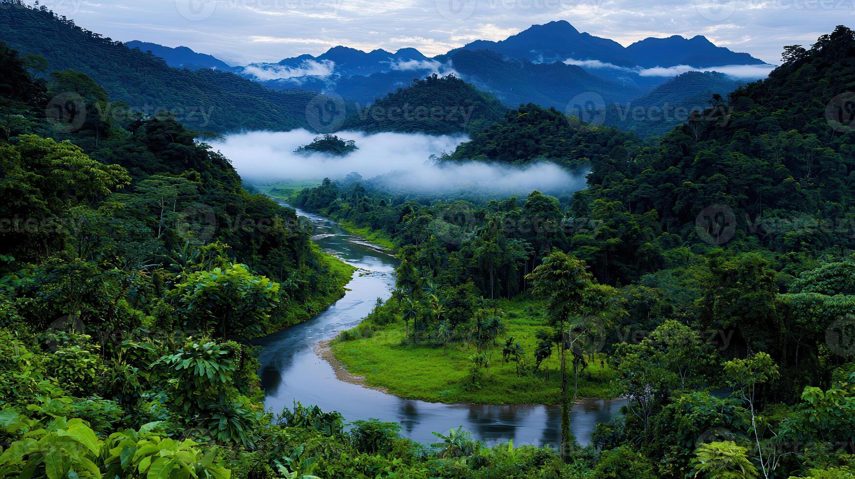 Serene River Winding Through Lush Green Tropical Rainforest Mountainscape at Dawn photo