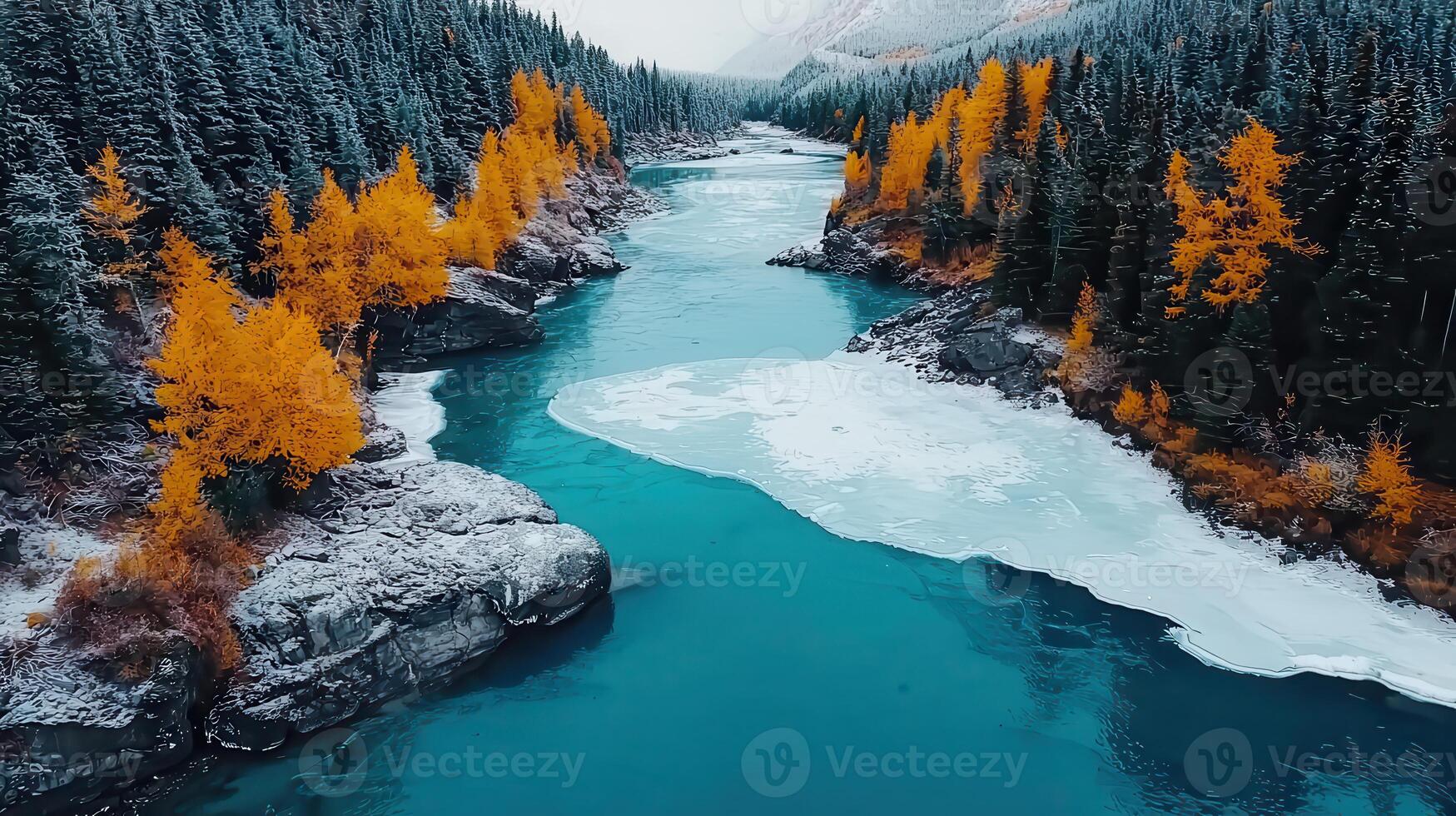 Stunning Aerial View of Turquoise River Autumn Colors Snow Covered Banks and Ice photo
