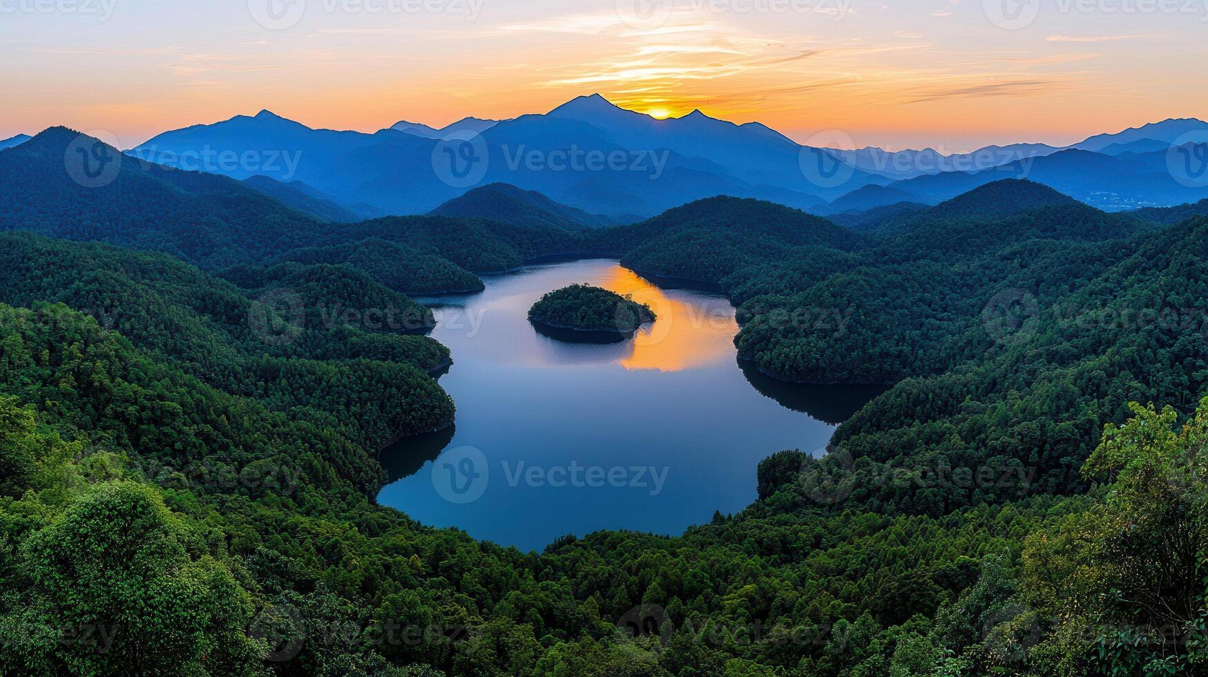 Serene Sunset Over Mountain Lake and Lush Forest Landscape photo