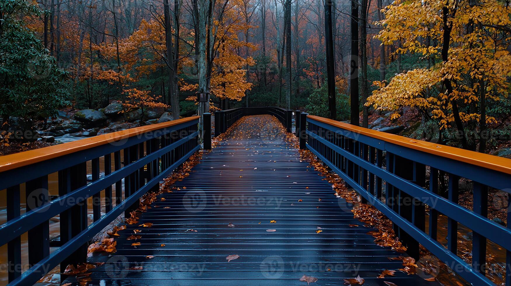 Serene Autumn Walkway Dark Wood Bridge in Colorful Fall Forest photo