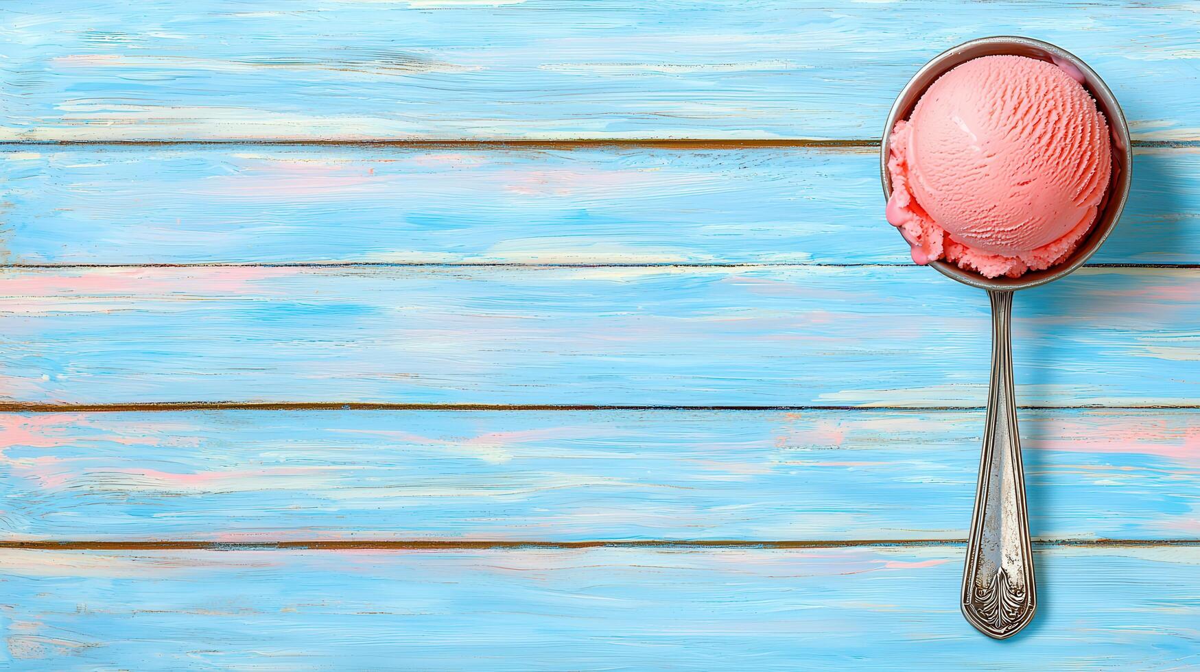 Delicious Pink Ice Cream Scoop on Rustic Blue Wooden Background Summer Dessert Sweet Treat photo