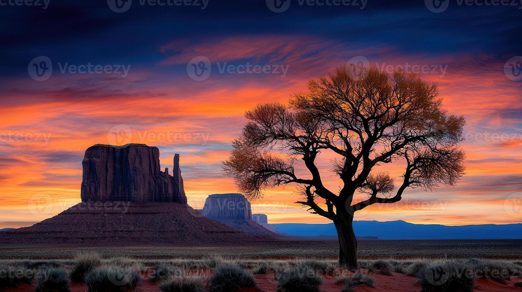 Dramatic Sunset over Monument Valley with Silhouetted Tree Arizona Landscape Photography photo