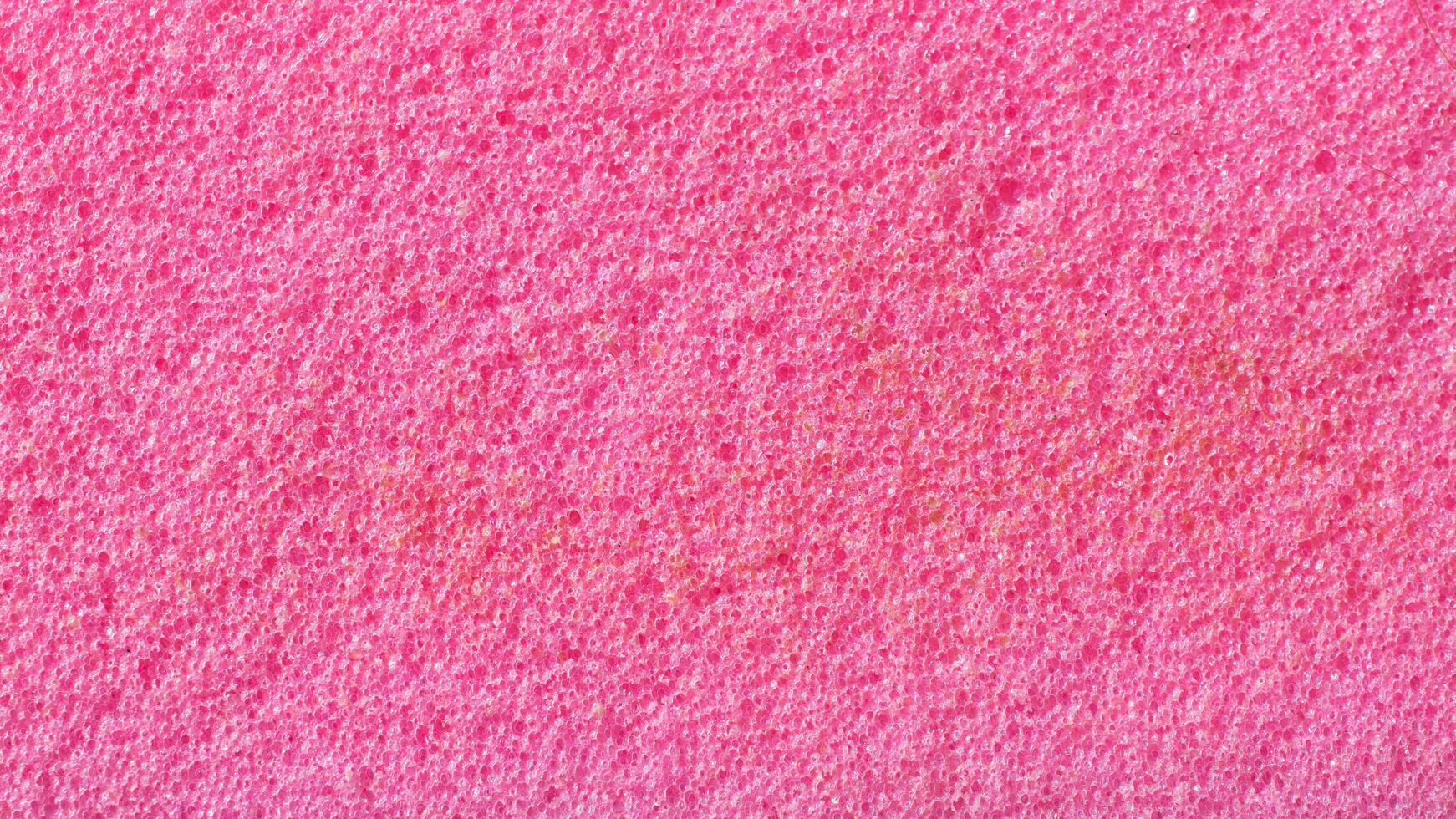 pink washing sponge with visible details photo