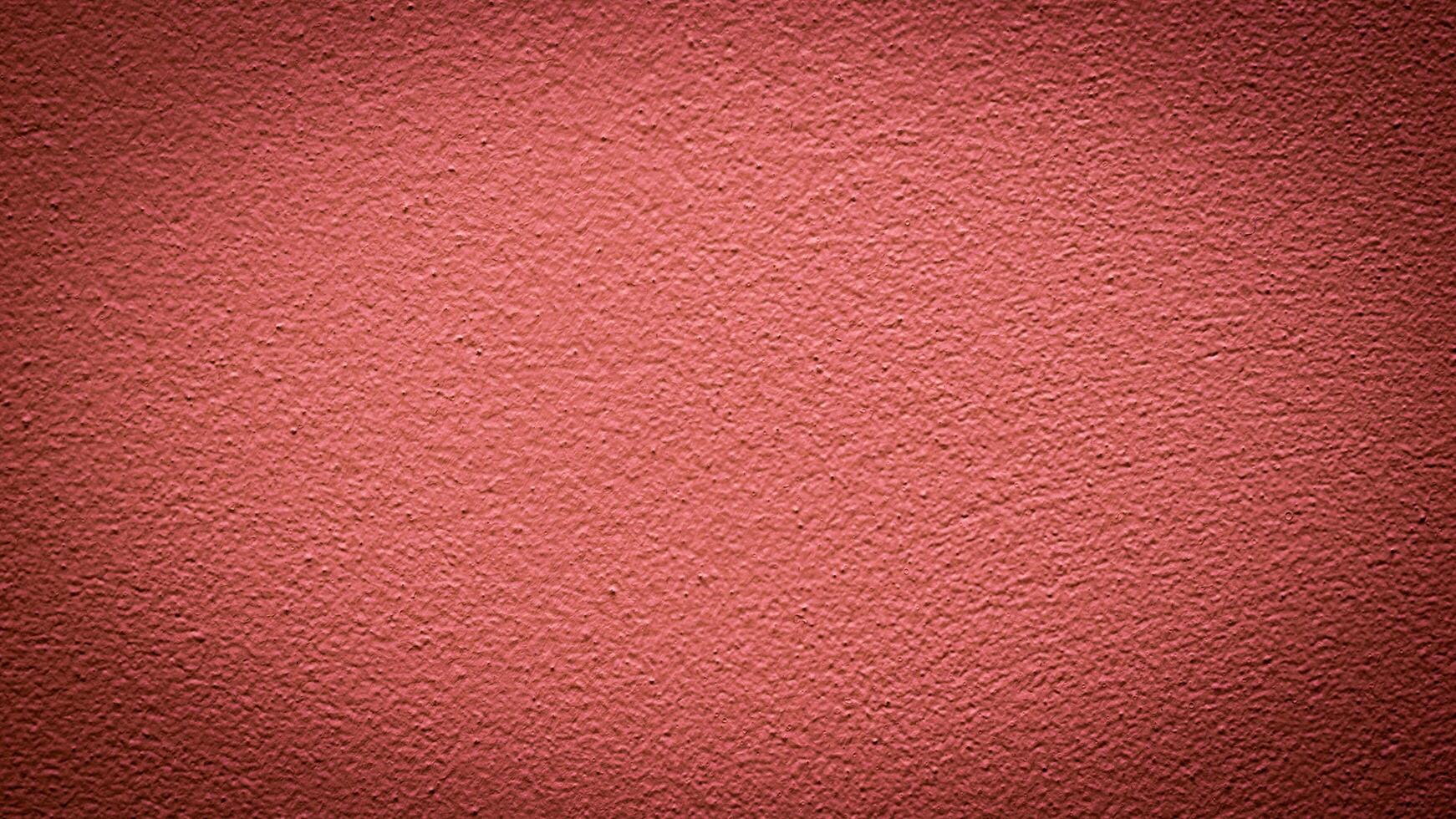 the wall is painted with red paint with visible details photo