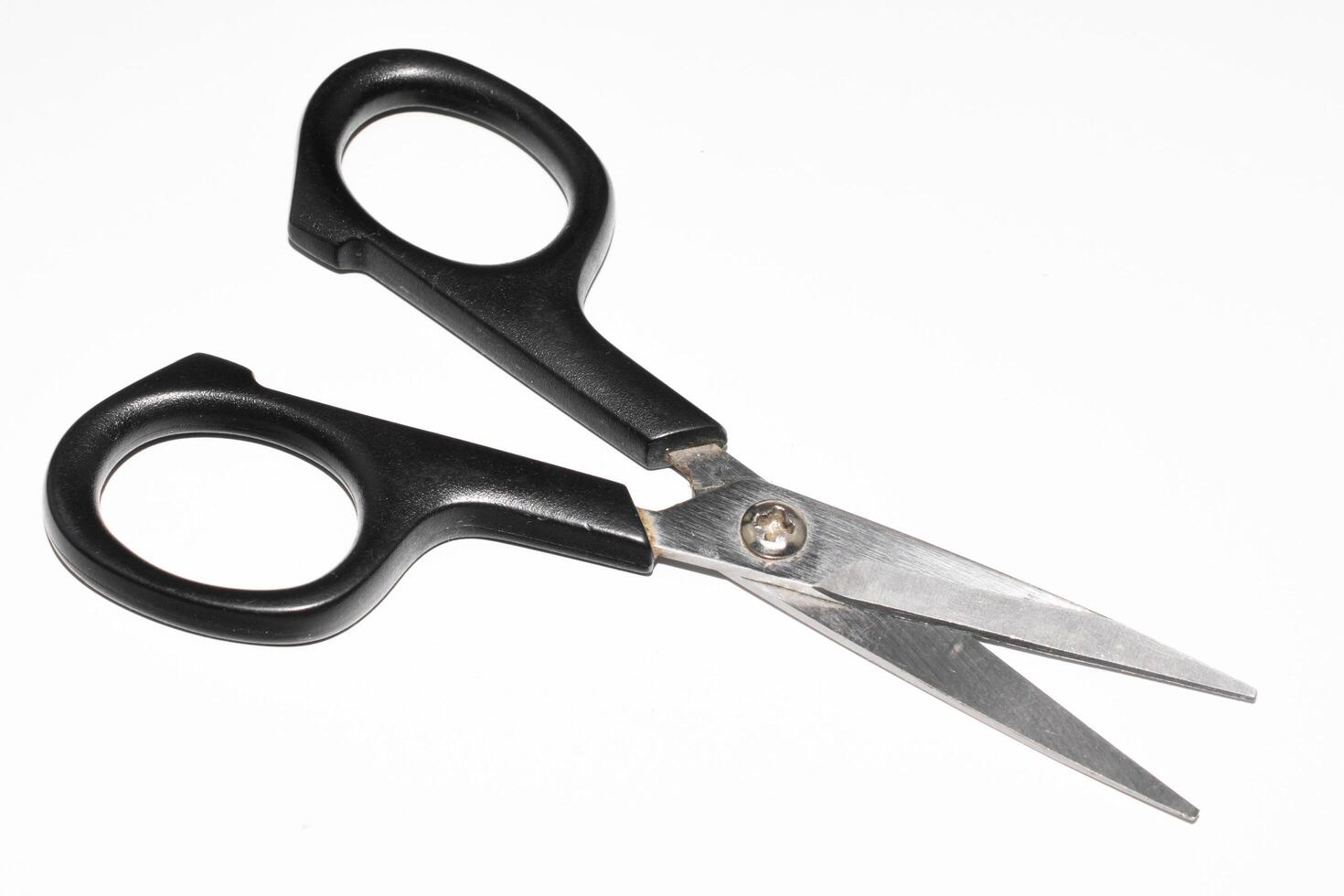 scissors with a black handle photo