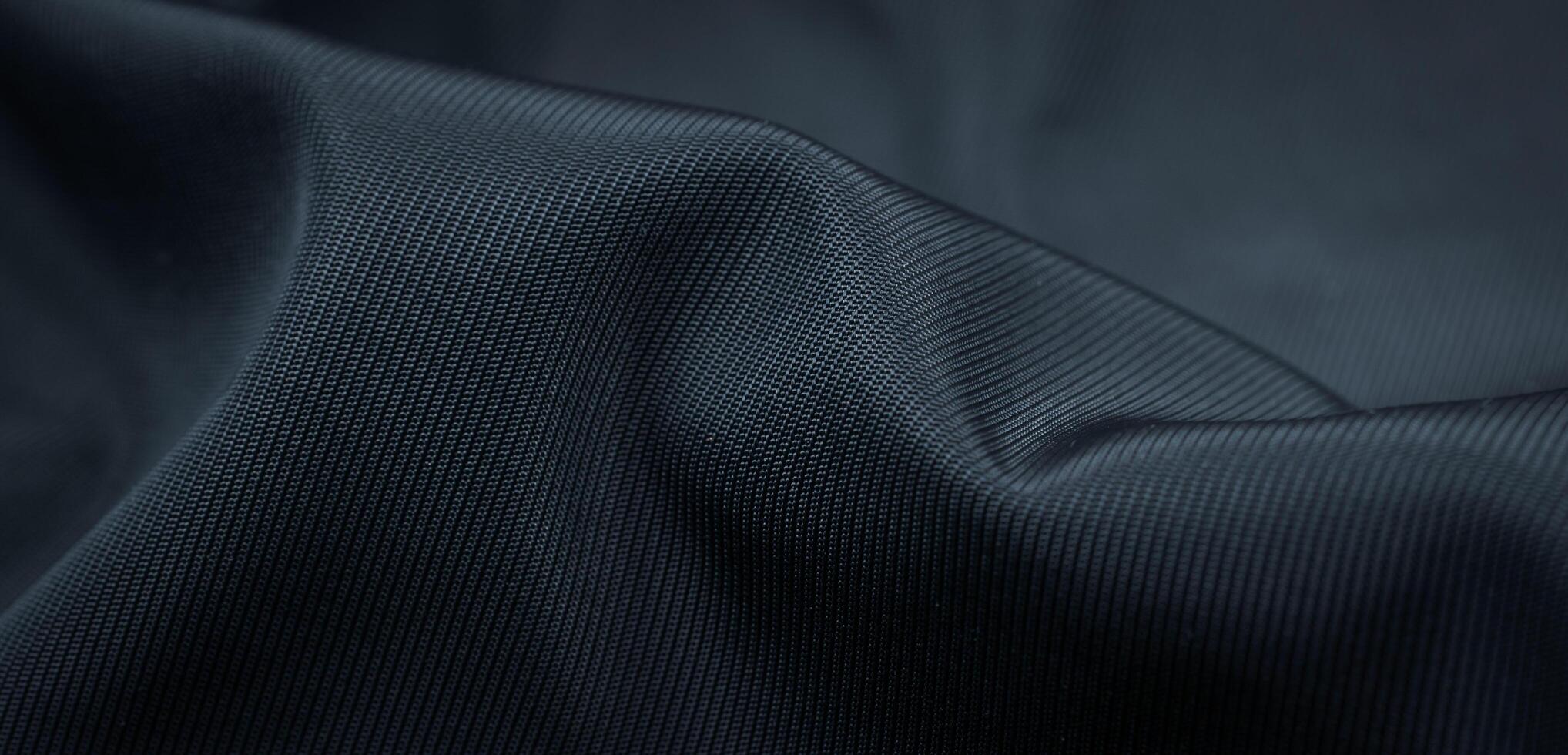 black crinkle cotton fabric with visible details. background photo
