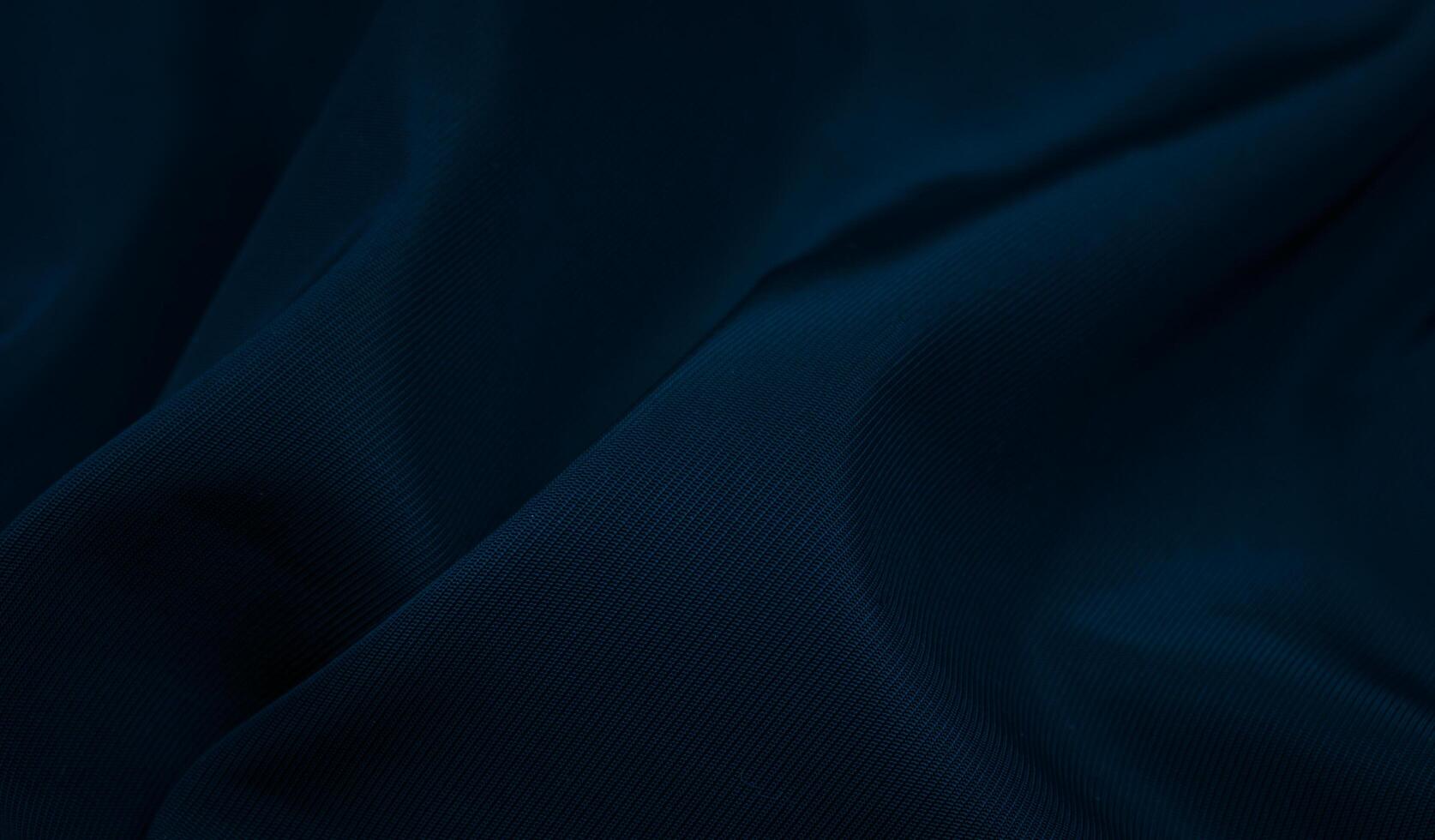 blue crinkled fabric with visible details. background photo