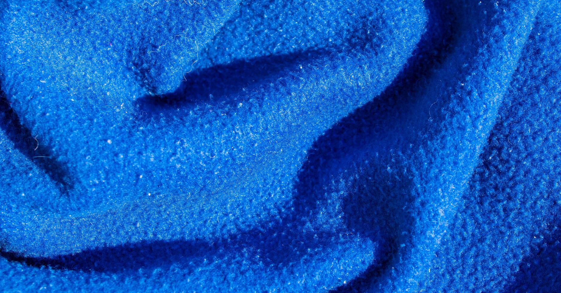 creased blue cotton fabric. photo