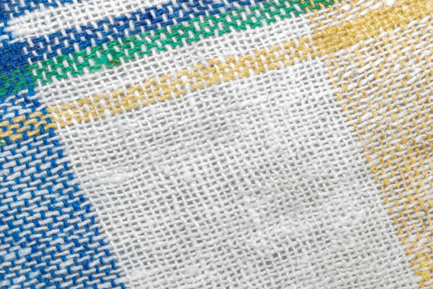 yellow and purple cotton fabric with visible details. texture or background photo