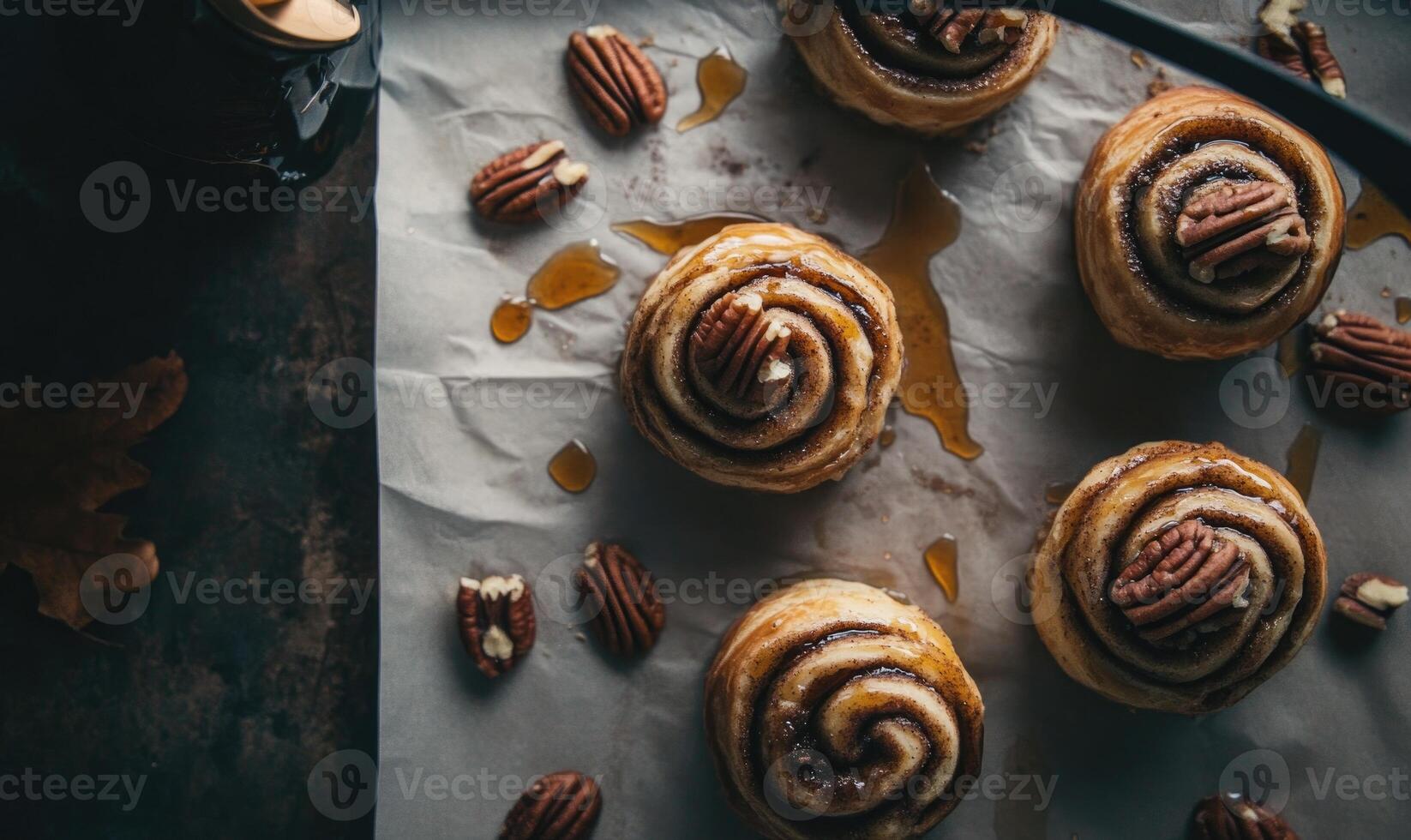 cinnamon rolls with pecans and maple syrup photo