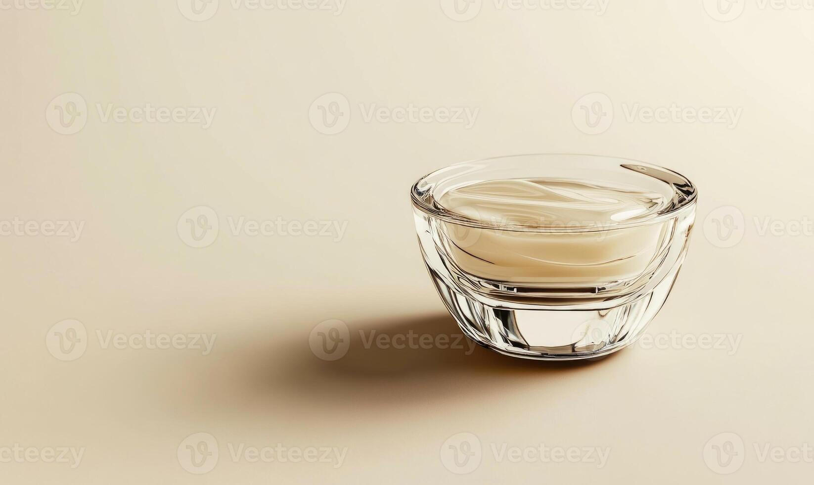 A clear glass bowl with a white substance in it photo