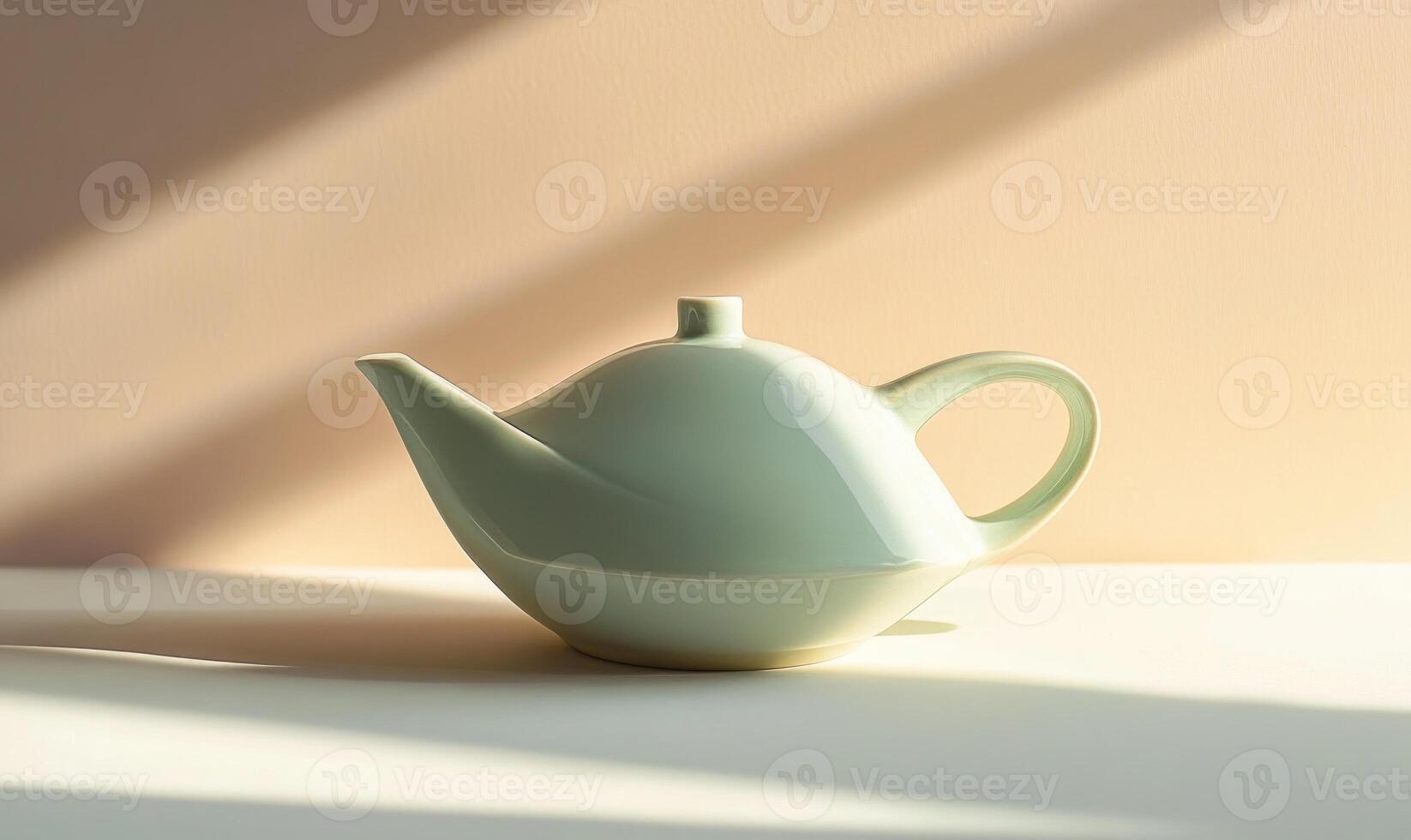 a white teapot sitting on a table in front of a window photo